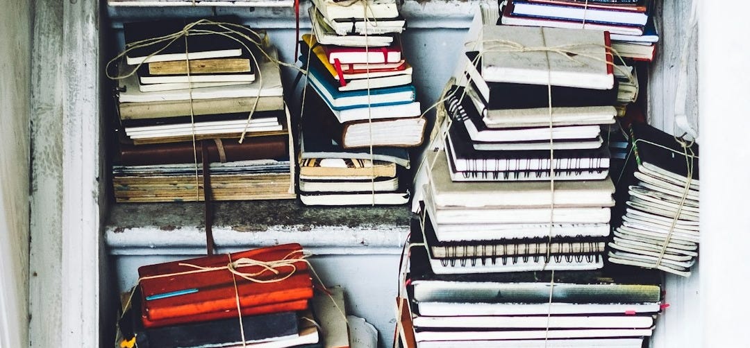 closeup photo of assorted-color book lot