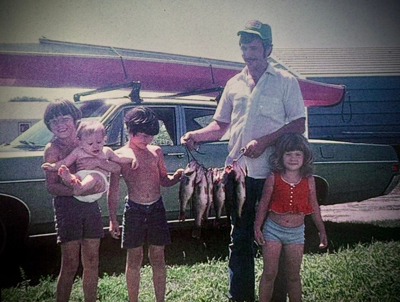 My dad with me and my siblings