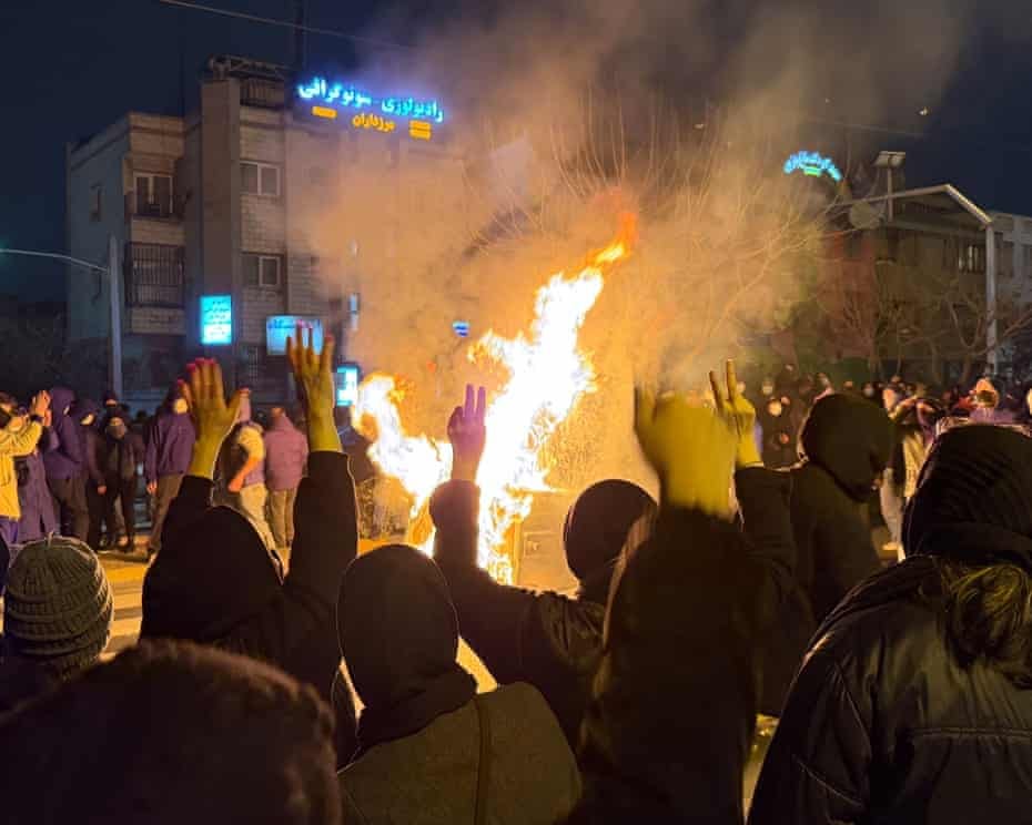 Iranians attend an anti-government protest in Tehran on 9 January Iranians attend an anti-government protest in Tehran on 9 January