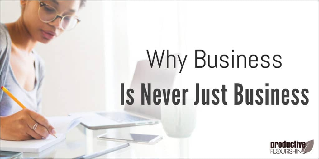 Image of a woman working at a desk. Text Overlay: Why Business Is Never Just Business Image of a woman working at a desk. Text Overlay: Why Business Is Never Just Business