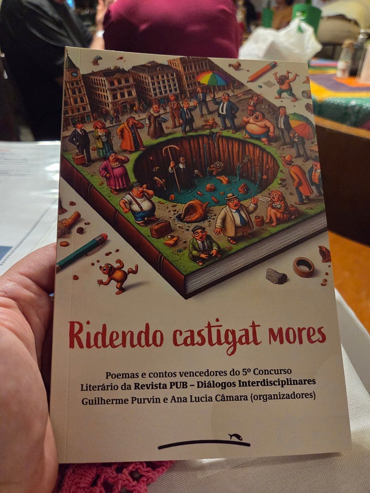 Livro Ridendo Castigat Mores, Terra Redonda. Na página aberta está o capitulo Valentina e o Robô sincero, meu nome logo abaixo Marcio Saraiva Melo