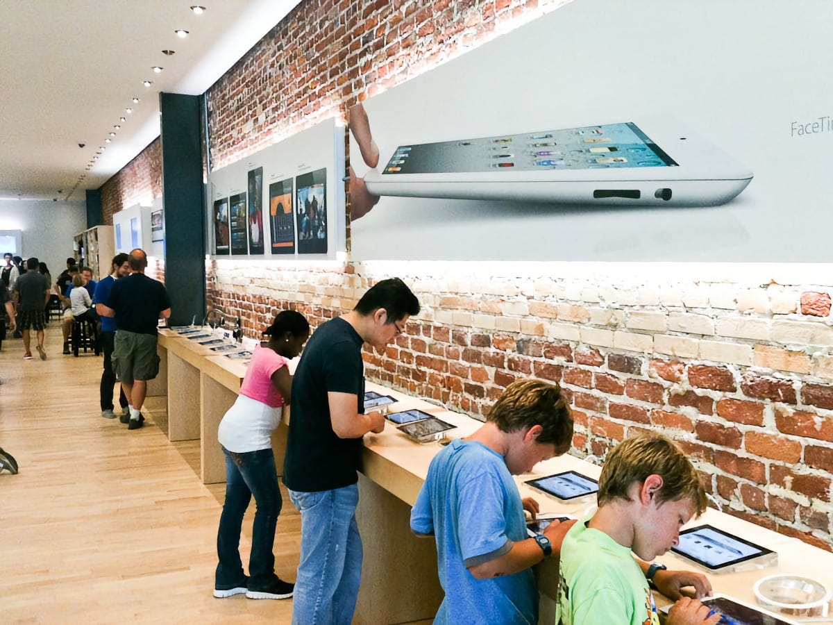 The interior brick walls of Apple Pasadena's temporary location.