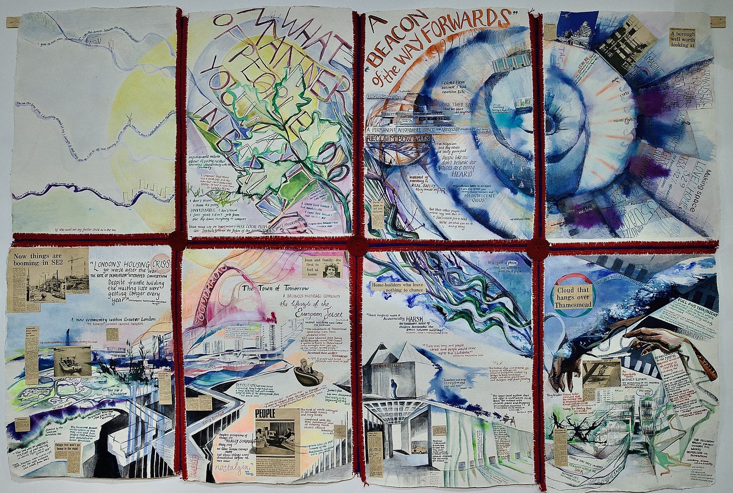 Large colorful crocheted map hanging on a white wall, featuring text and stitched geographic lines. Large colorful crocheted map hanging on a white wall, featuring text and stitched geographic lines.