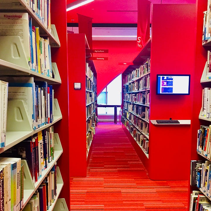 Four photos of libraries, featuring shelves of books and patrons