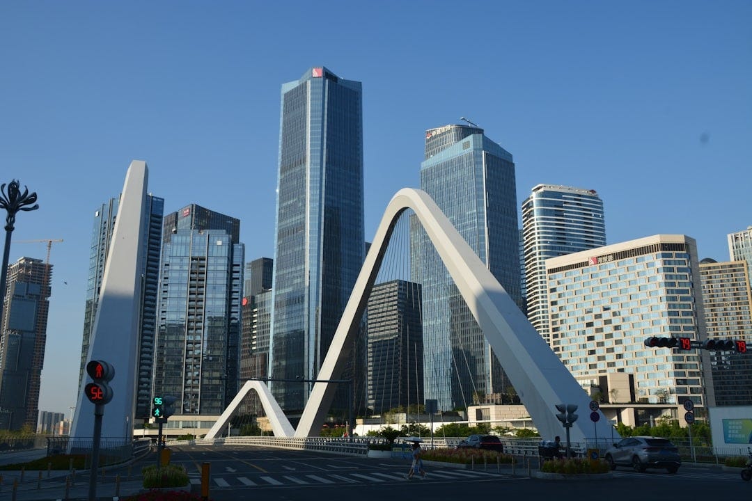 A city skyline with tall buildings in the background