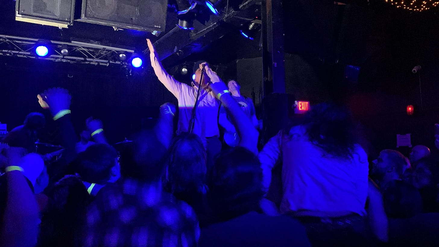 Fiddlehead at Ottobar. Pat Flynn has his arm outstretched toward the sky