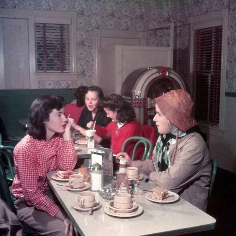 Smith College students in 1948, dressed in fashionable skirts and sweaters, enjoying the vibrant campus atmosphere. Smith College students in 1948, dressed in fashionable skirts and sweaters, enjoying the vibrant campus atmosphere.