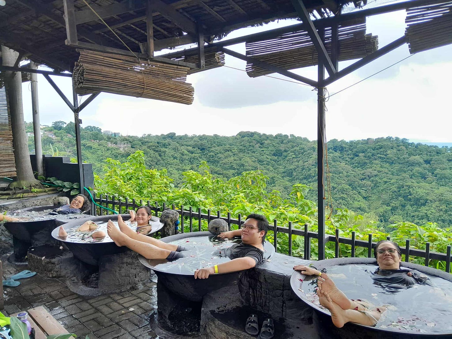 My family chilling in our kawa baths.