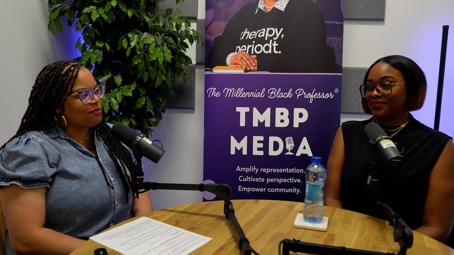 Dr. Tasha, known as The Millennial Black Professor, sits on the right side with her guest, preparing to record her podcast, BLACK in One Piece.