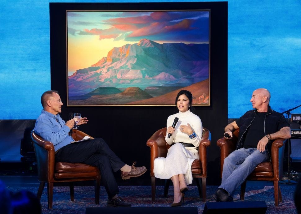 Three people sit on panel