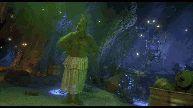 a grinch says it 's not a dress it 's a kilt in a cave