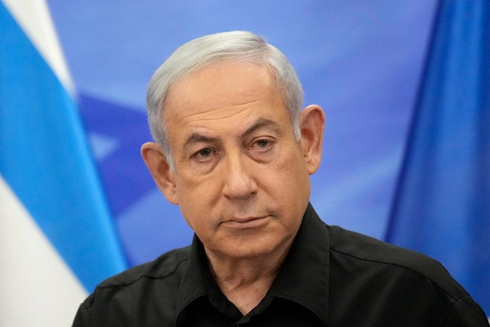 Israeli Prime Minister Benjamin Netanyahu attends a joint press conference with French President Emmanuel Macron in occupied al-Quds, on October 24, 2023. (AP) Israeli Prime Minister Benjamin Netanyahu attends a joint press conference with French President Emmanuel Macron in occupied al-Quds, on October 24, 2023. (AP)