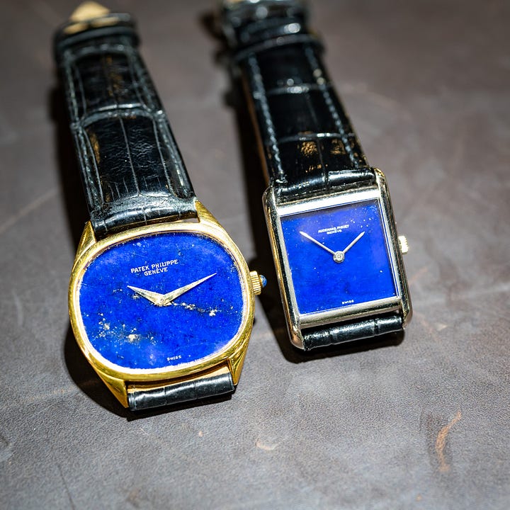 A collection of vintage stone dial watches.