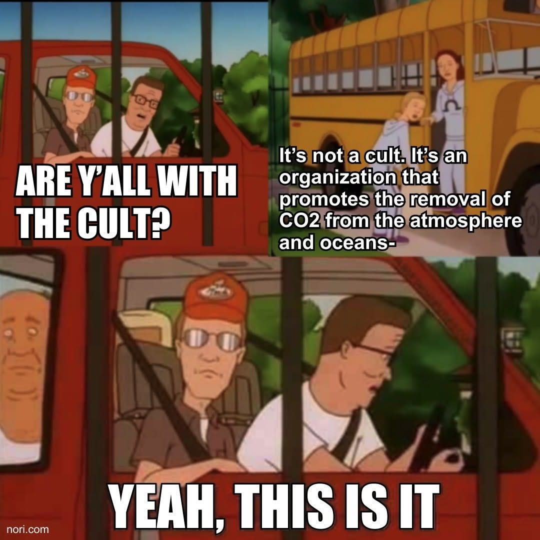 King of the Hill panels. Hank in his truck: "Are y'all with the cult?" A woman: "It's not a cult. It's an organization that promotes the removal of CO2 from the atmosphere and oceans—" Hank: "Yeah, this is it."