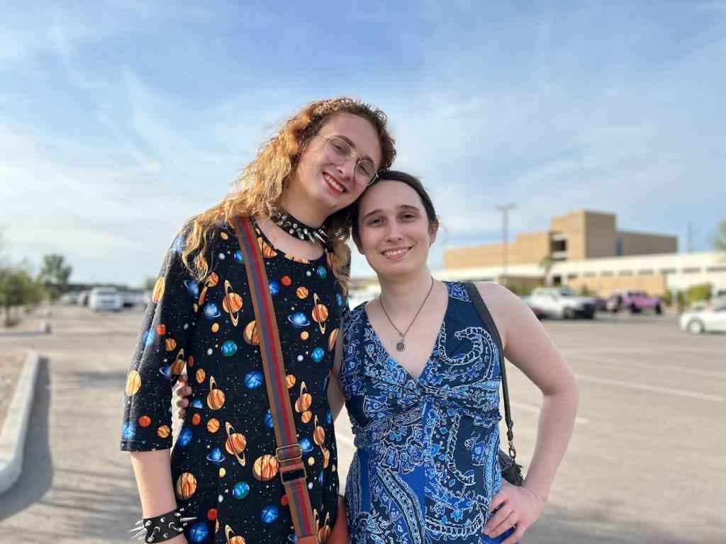 A wedding photograph of Autumn Hill and her wife. A wedding photograph of Autumn Hill and her wife.