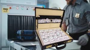 Suitcases filled with millions in cash ... Suitcases filled with millions in cash ...