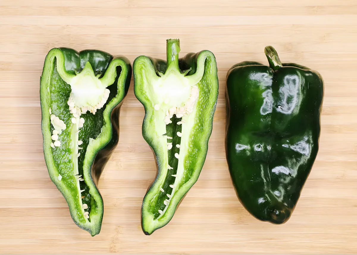 Poblano chiles on cutting board