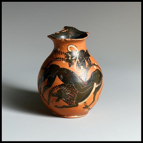 A Greek jug showing Herakles wrestling the Nemean lion