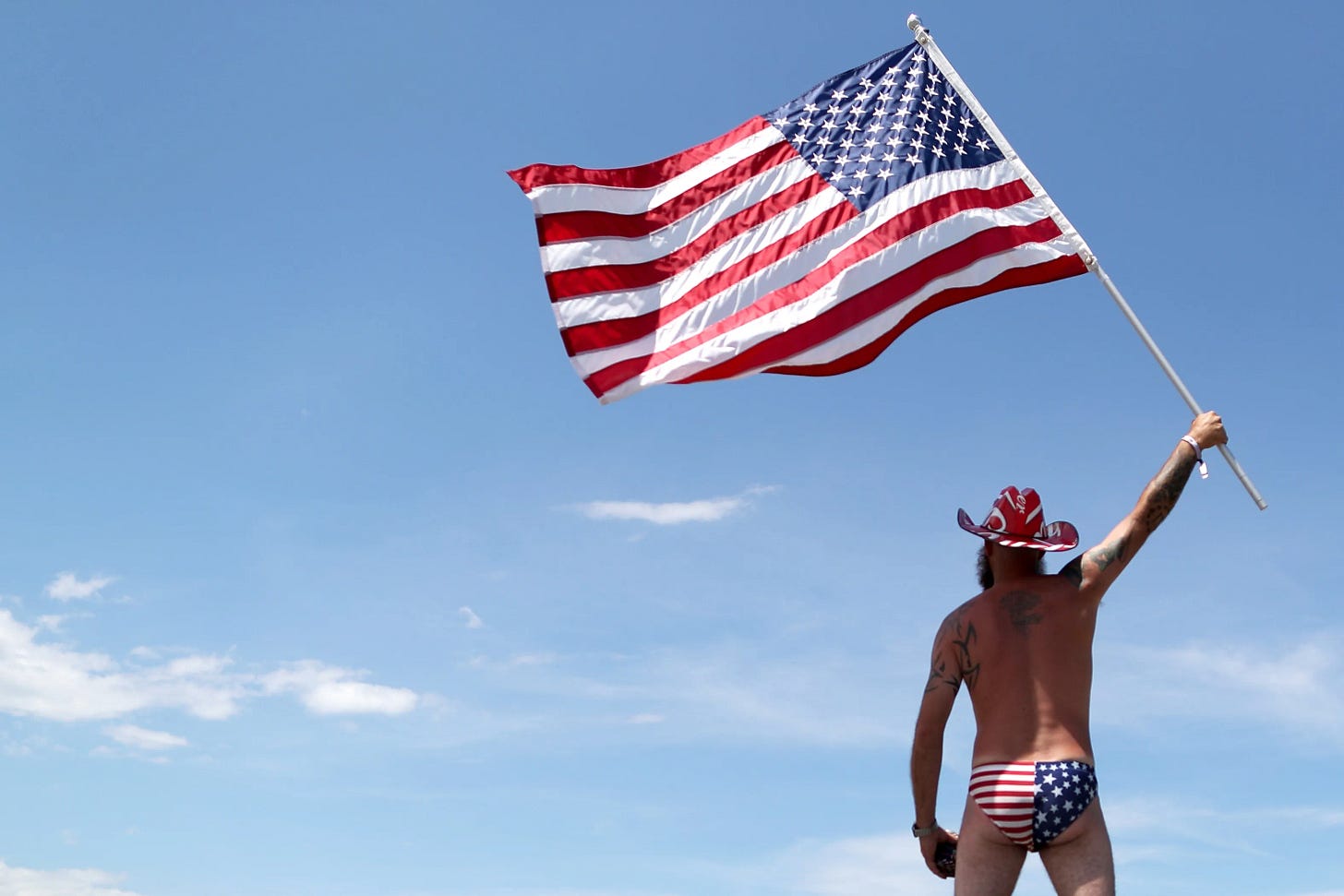 Only Patriotism Can Save the US From Nationalism in 2024 - Bloomberg