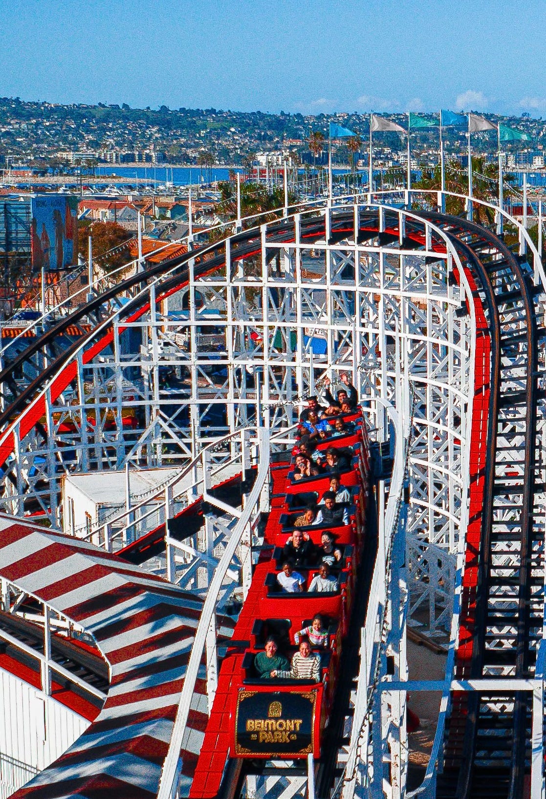 scenic over view of Giant Dipper roller coaster with riders scenic over view of Giant Dipper roller coaster with riders