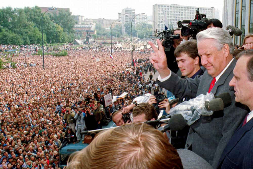 Aug. 22, 1991: Russian Republic President Boris Yeltsin (second right) makes a V-sign to thousands of Muscovites, as his top associate Gennady Burbulis (right) stands near during a rally to celebrate the failed military coup in Moscow, Russia. When a group of top Communist officials ousted Soviet leader Mikhail Gorbachev 30 years ago and flooded Moscow with tanks, the world held its breath. But the August 1991 coup collapsed in just three days, precipitating the breakup of the Soviet Union that plotters said they were trying to prevent. (Alexander Zemlianichenko/AP) Aug. 22, 1991: Russian Republic President Boris Yeltsin (second right) makes a V-sign to thousands of Muscovites, as his top associate Gennady Burbulis (right) stands near during a rally to celebrate the failed military coup in Moscow, Russia. When a group of top Communist officials ousted Soviet leader Mikhail Gorbachev 30 years ago and flooded Moscow with tanks, the world held its breath. But the August 1991 coup collapsed in just three days, precipitating the breakup of the Soviet Union that plotters said they were trying to prevent. (Alexander Zemlianichenko/AP)