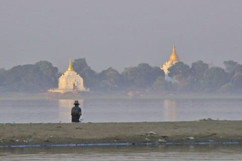 BURMA: Temple spires break the horizon at Amarapura BURMA: Temple spires break the horizon at Amarapura