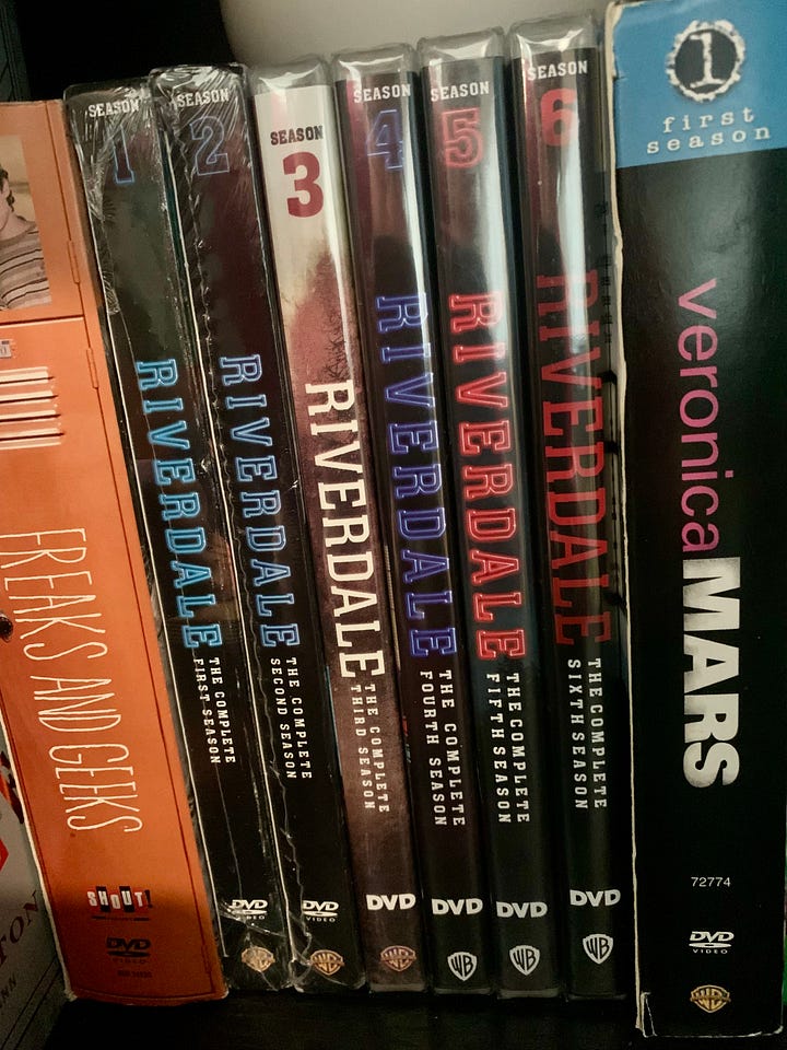 An image of Season 1-6 of Riverdale on DVD; an image of my handwriting in my notebook, "Riverdale: An American Masterpiece"