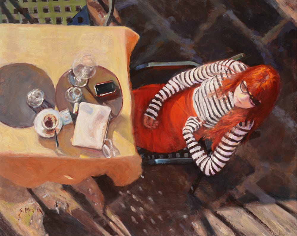 A person sitting at a table

Description automatically generated