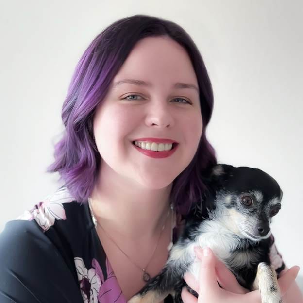 A person holding a dog

AI-generated content may be incorrect.