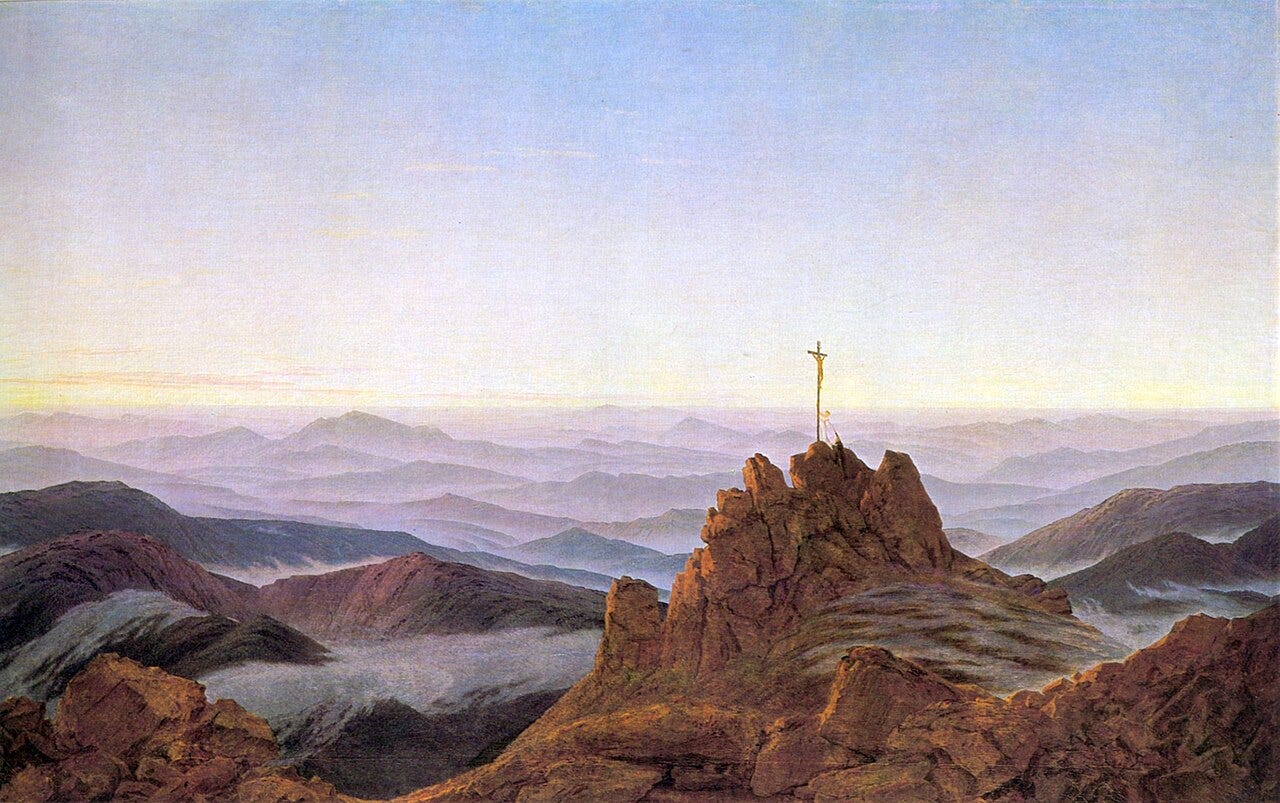 Friedrich's mountain sunrise with a summit cross rising through morning haze Friedrich's mountain sunrise with a summit cross rising through morning haze