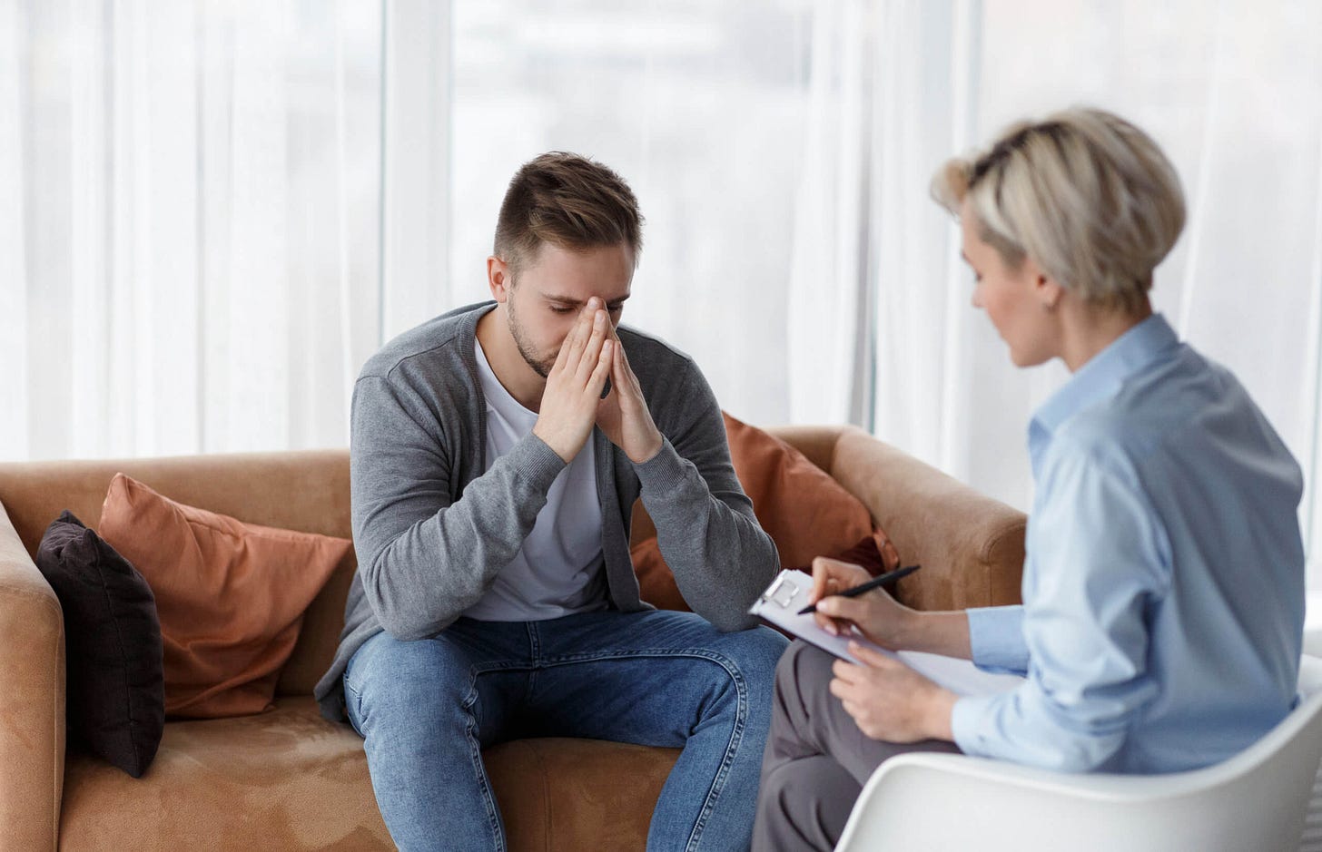 a man talks to a therapist