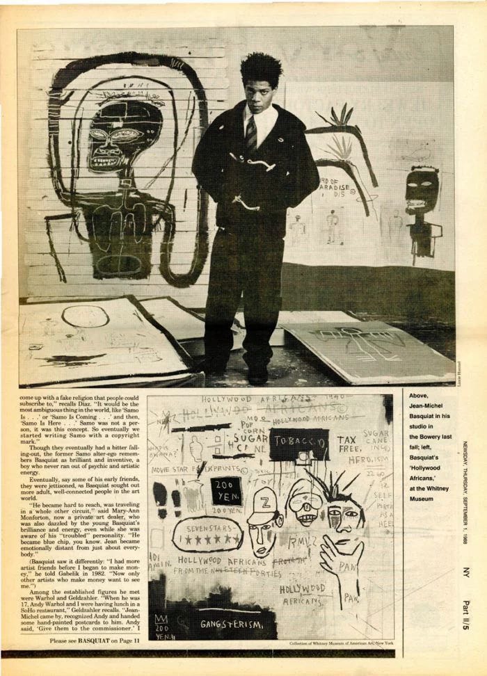 This may contain: a man standing in front of a drawing on top of a piece of newspaper paper This may contain: a man standing in front of a drawing on top of a piece of newspaper paper