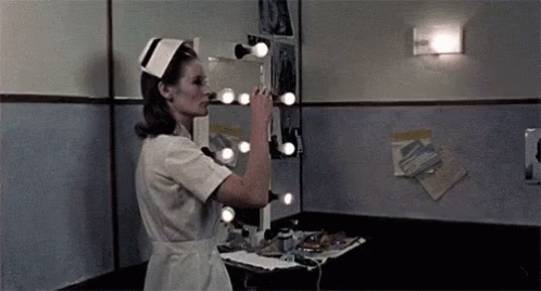 Evil Nurse GIF - Nurse Injection Syringe - Discover & Share GIFs
