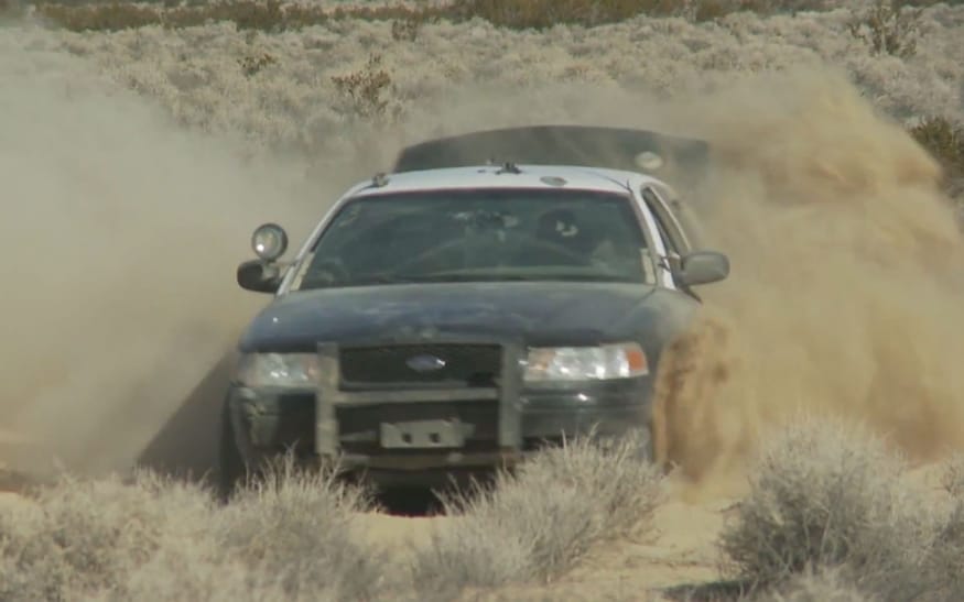 Police Shootout: Ford Crown Victoria, Chevy Caprice Go Off-Road on Roadkill