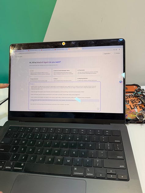 A five-image gallery from Tuya’s CES demo showing attendees interacting with Tuya’s smart-home platform: booth displays outlining how conversational prompts configure devices, close-up shots of the interface on a laptop, and Tuya staff demonstrating how natural-language commands generate on-device automations.