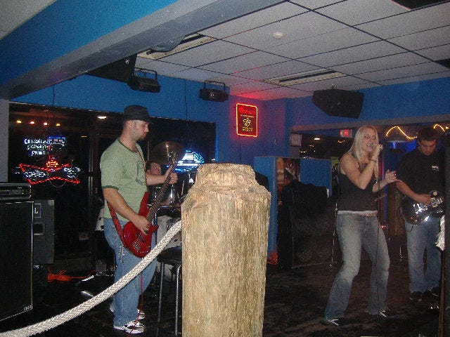 The nameless (thus far) opening band at the Monkey Barrel, November 10, 2006. The nameless (thus far) opening band at the Monkey Barrel, November 10, 2006.