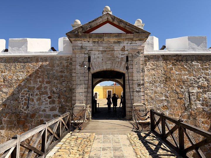 Fuerte de San Diego entrance, cannon, model ship, headdress sculpture