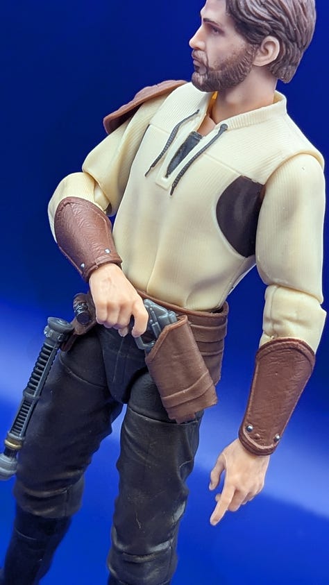 Three images of Star Wars: The Black Series Kyle Katarn. Left picture: facing left, hand on his pistol. Center photo: neutral phose, with hands on his side. Right picture: facing right, holding his lightsaber.