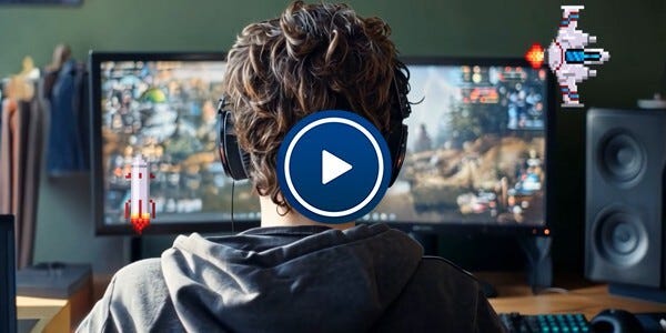 Young man playing video games online in front of two large monitors