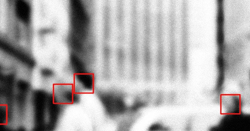 Face recognition signs and tags on people faces. Privacy and personal data protection. Blurred picture with drawn symbols. 