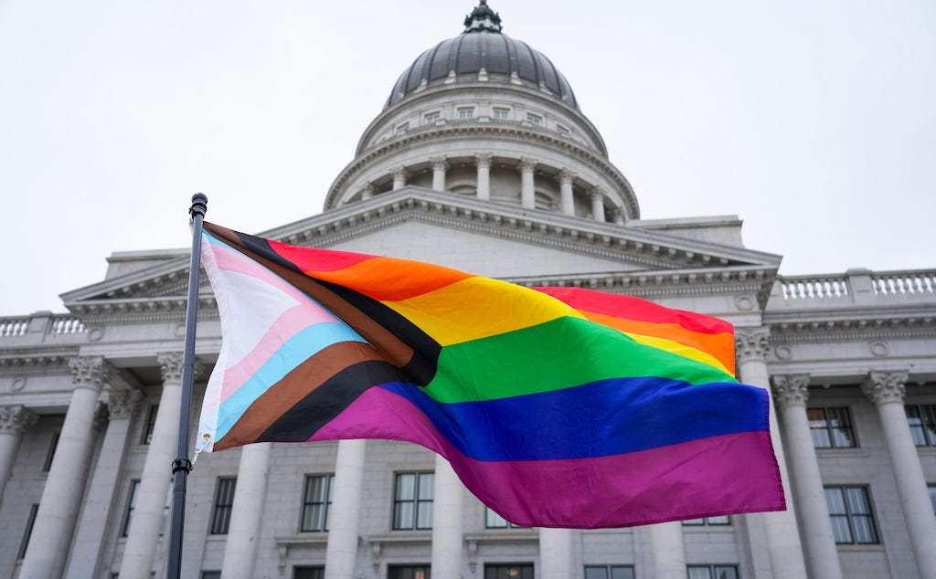 (Bethany Baker  |  The Salt Lake Tribune) A Progress Pride flag waves in front of the Utah Capitol during the Rally for Trans Community Support in Salt Lake City Friday, Jan. 24, 2025.