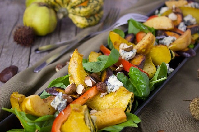 Pumpkin salad with egg and walnuts
