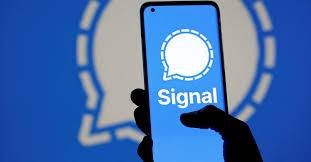 May be an image of phone and text that says 'Signal'