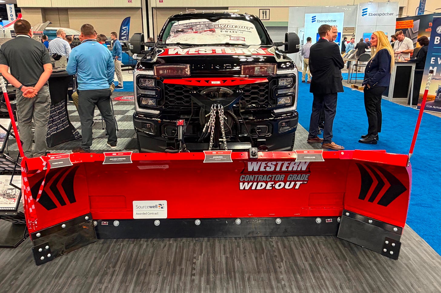 A Douglas Dynamics snowplow under the Western Brand, at Work Truck Week 2026