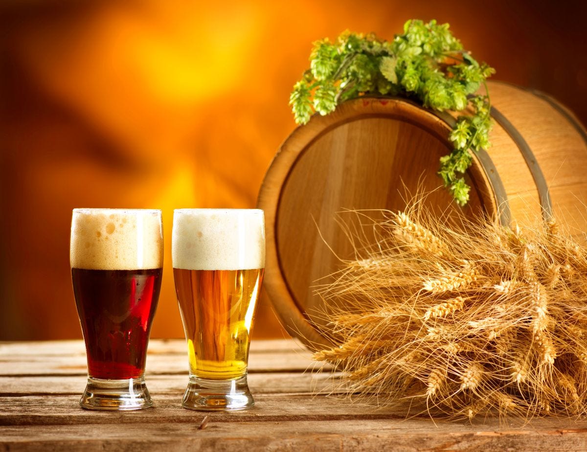 Vintage beer barrel and two glasses