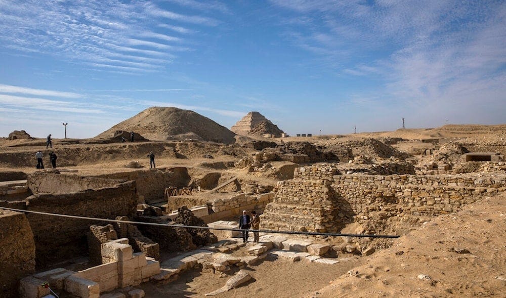 The site where Egyptian archaeologist Zahi Hawass and his team unearthed a trove of ancient coffins, artifacts, and skulls in a vast necropolis south of Cairo, Sunday, Jan. 17, 2021, in Saqqara, south of Cairo, Egypt. (AP Photo/Nariman El-Mofty) The site where Egyptian archaeologist Zahi Hawass and his team unearthed a trove of ancient coffins, artifacts, and skulls in a vast necropolis south of Cairo, Sunday, Jan. 17, 2021, in Saqqara, south of Cairo, Egypt. (AP Photo/Nariman El-Mofty)