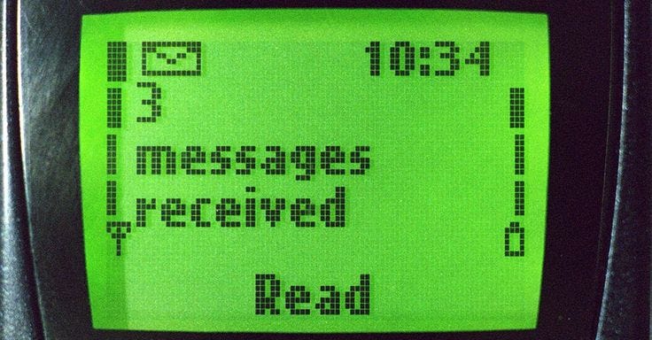 This may contain: an old computer screen with the words message board on it's display, in front of a black background