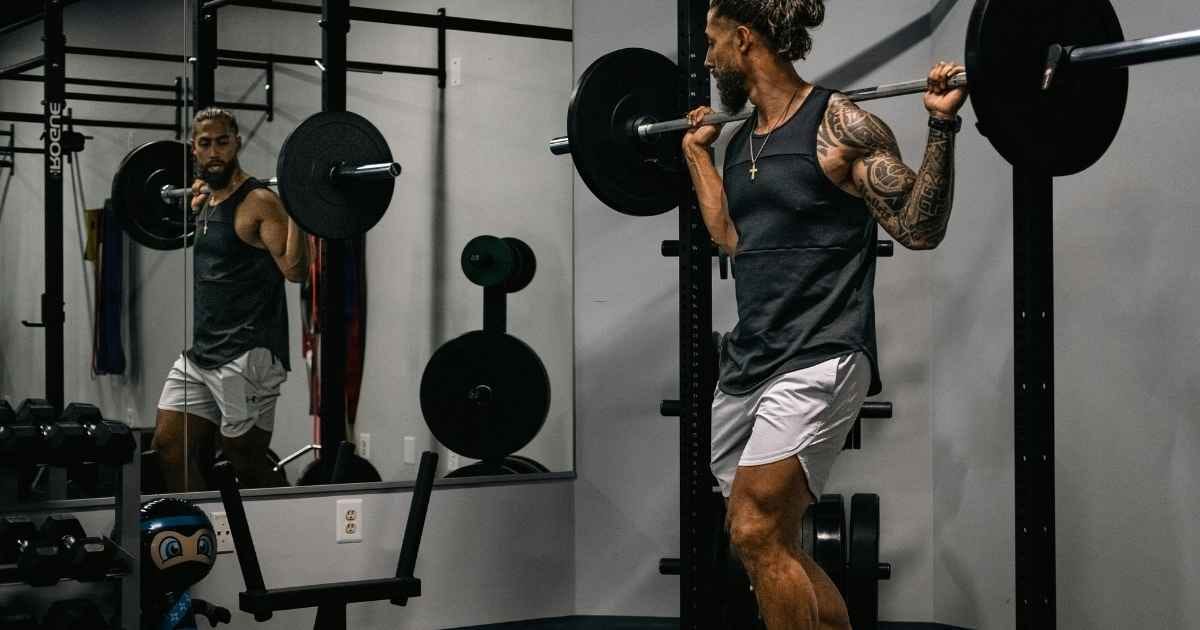 A man lifting weights in the gym
