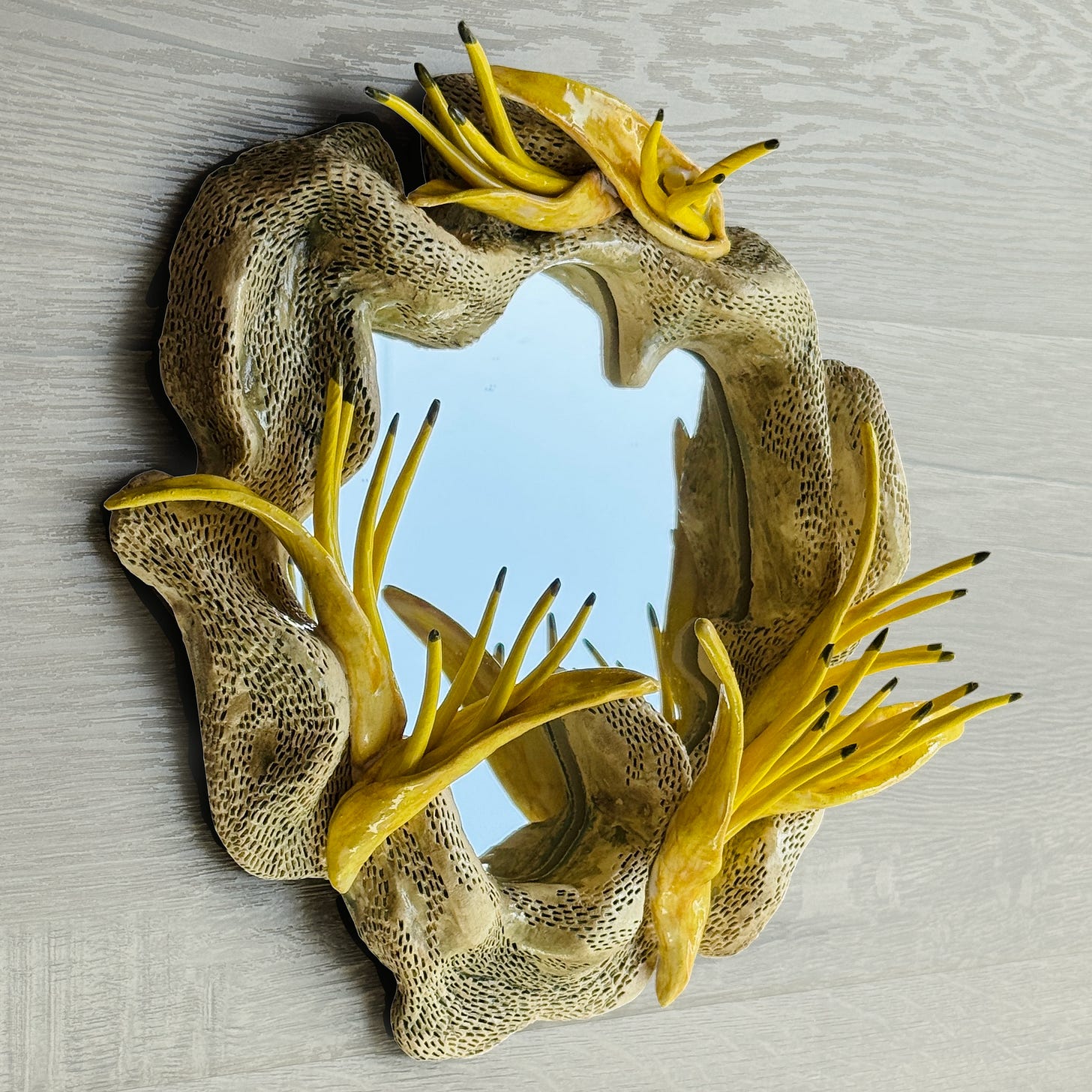 Stoneware sculpture Heliconia by Moti Tavassoli.