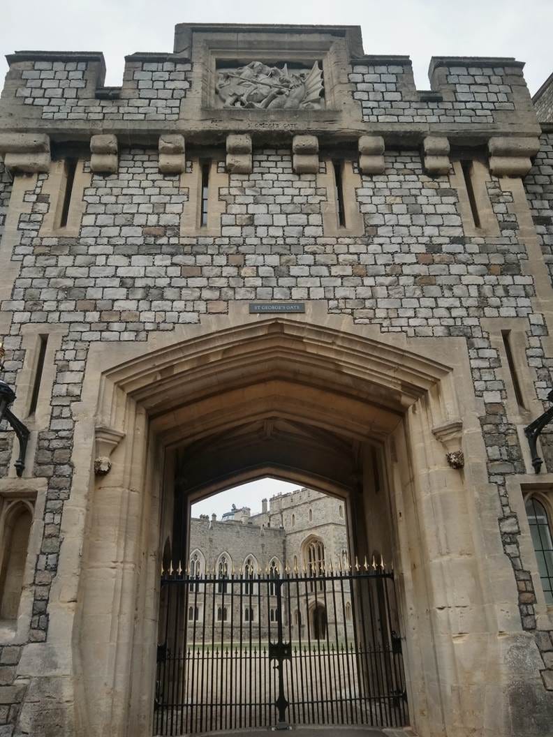 A stone building with a gate
AI-generated content may be incorrect. A stone building with a gate
AI-generated content may be incorrect.
